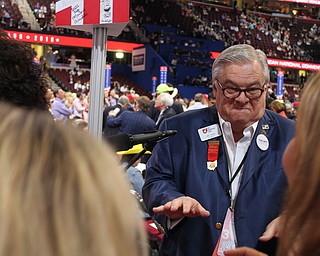 Jim Dicke, an at-large Ohio delegate at the Republican National Convention, dances to start the Wednesday evening session..
