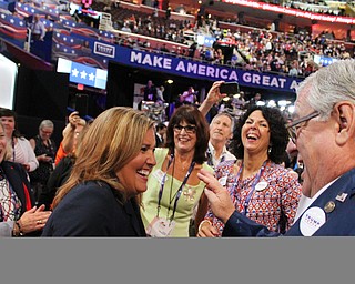 Lt. Gov. Mary Taylor and other members of the Ohio delegation to the Republican National Convention dance during the start of WednesdayÕs evening session..