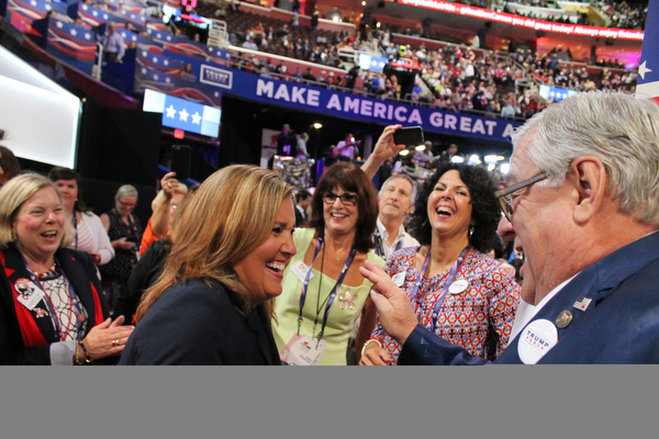 Lt. Gov. Mary Taylor and other members of the Ohio delegation to the Republican National Convention dance during the start of WednesdayÕs evening session..