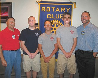 SPECIAL TO THE VINDICATOR
Three Austintown Fitch High School seniors were chosen to receive the William Courtney Austintown Rotary Scholarship for 2016. The scholarships were presented by Fitch Interact advisers Tina Kubacki and Gary Reel at the July 11 meeting. From left are Reel; Max Bleggi, Bradley Linton and Matt Rozic, scholarship recipients; and Ed Kalaher, rotary president. Bleggi will attend Ohio State University, Linton will attend Youngstown State and Rozic will attend Duquesne. The William Courtney Scholarship was named for a long-term Rotarian who generously donated to the Polio Plus and Rotary Foundation on behalf of the Austintown club.