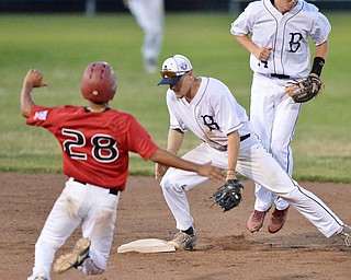 Jeff Lange | The Vindicator  THU, JUL 21, 2016 - Baird second baseman Mark Engle (center) steps on the bag to force out Ontario base runner Reilly Walters (28) in the top of the third inning as Baird's John Matthews hops out of the way during Thursday's game in Struthers.