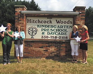 SPECIAL TO THE VINDICATOR
Hitchcock Woods Early Learning Center in Boardman earned its second Step Up to Quality Achievement Award from the Ohio Department of Job and Family Services. The award is a five-star quality rating which recognizes and promotes learning and development programs that meet quality program standards which exceed licensing health and safety regulations. Staff members at Hitchcock Woods celebrating the award, from left, are Abbey Loree, Pattie Welsh, Nancy Meenachan and Betty Cmil. The Center also is hosting a “Finding Dory” themed family fun day 1 to 5 p.m. July 31. There will be a book reading, activities, treat bags, a coloring contest and refreshments. The public is welcome to attend and meet the teachers at Hitchcock. Attendees will have a chance to win a week of free childcare. Call 330-758-2108 for information.