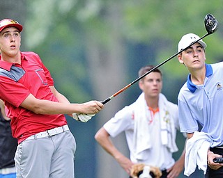 Jeff Lange | The Vindicator  FRI, JUL 22, 2016 - Boardman's Bryan Kordupel (left) and caddy Tyler Harbert of Springfield watch Kordupel's drive from the No. 5 tee box during Friday's Greatest Golfer of the Valley Junior finals held at Avalon at Squaw Creek.