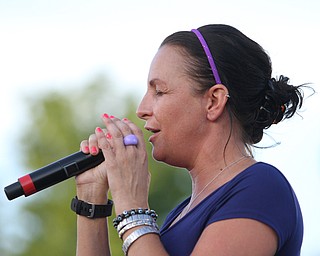 Nikos Frazier | The Vindicator..Stacy Keller sings the national anthem at the South Side Boxing Club Championship Night at the Covelli Center.