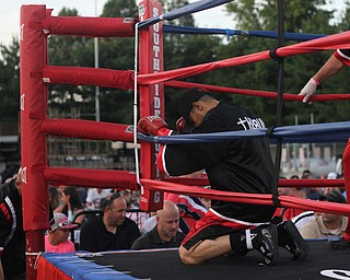 Nikos Frazier | The Vindicator..Jake "The Bull" Giuriceo of Youngstown kneels before battling Jose Abrue of the Dominican Republic at the South Side Boxing Club Championship Night at the Covelli Center.