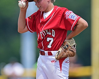 BOARDMAN, OHIO - JULY 24, 2016: Starting pitcher Nate Shaw #7 of Canfield  shows his frustration after allowing a solo home run to Micaden Stephens #11 of Hamilton in the fourth inning of Sunday afternoons Little League State Championship Game at the Fields of Dreams. Hamilton won 11-0. DAVID DERMER | THE VINDICATOR
