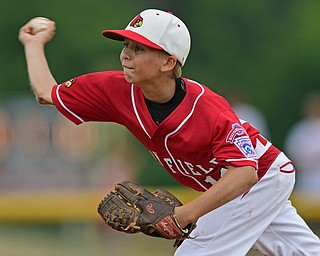 BOARDMAN, OHIO - JULY 24, 2016: Relief pitcher Ryan Petro #12 of Canfield delivers in the fourth inning of Sunday afternoons Little League State Championship Game at the Fields of Dreams. Hamilton won 11-0. DAVID DERMER | THE VINDICATOR