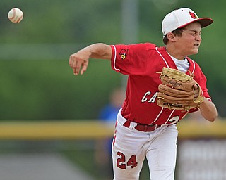 BOARDMAN, OHIO - JULY 24, 2016: Second baseman Drew Carroce #24 of Canfield throws first in a unsuccessful attempt to throw out Cayden Evans #1 of Hamilton in the fifth inning of Sunday afternoons Little League State Championship Game at the Fields of Dreams. Hamilton won 11-0. DAVID DERMER | THE VINDICATOR