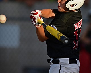 BOARDMAN, OHIO - JULY 26, 2016: Luca Ricchiuti(13) of Canfield fouls off a pitch in the first inning of the Ohio 10/11 Little League Championship game Tuesday night at the Fields of Dreams. DAVID DERMER | THE VINDICATOR