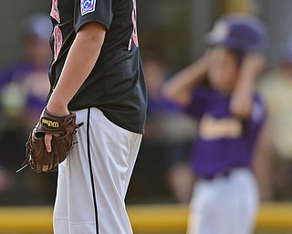 BOARDMAN, OHIO - JULY 26, 2016: Starting pitcher Connor Miller(10) of Canfield shows his frustration on the mound after walking the bases loaded in the second inning of the Ohio 10/11 Little League Championship game Tuesday night at the Fields of Dreams. DAVID DERMER | THE VINDICATOR