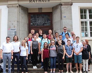 SPECIAL TO THE VINDICATOR
Students from Boardman High School, Austintown Fitch and Cardinal Mooney with Sieglinde and Larry Warren, exchange coordinators, recently returned from Hennef, Germany, where they stayed in the home of exchange students they hosted last fall. Hennef is on the Rhine River near Cologne. The students climbed the 533 steps to an observation platform at Cologne Cathedral, toured Amsterdam by boat and on foot, took a rafting tour on the Rhine and completed an obstacle course in the trees of Hennef. This was the 12th year the exchange has taken place. The next exchange is in the planning stages. In front from left, are Hennef Mayor Klaus Piepke; Jost Wiebeke and Julia Kalscheid, teachers at Hennef; Madison Rast, Boardman; Madison Glavic, Fitch; Milena Noll, Hennef; Jarrod Stover and Ethan Schwendeman, Boardman; Sieglinde Warren, Poland; and Marlene Seim, Siegburg. In row two are Nadja Susko and Luise Bauer, Hennef; Nick Stamp, Boardman; Grace Haddad, Mooney; and Alex Lueck, Jeff Lee and Bernhard Huth, Hennef. In row three are Anna Wiebeke and Gina Overath, Hennef; and Linh Tran, Boardman. And in row four are Simon Pusateri, Boardman; Nils Linke and Florian Weinberg, Hennef; David Carr, Fitch; and Larry Warren, Poland.