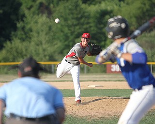 Nikos Frazier | The Vindicator..East Holmes pitcher, Kobe Shetler(34) fires home during the first inning of the Junior Little League State Championship game at the Fields of Dreams in Boardman.
