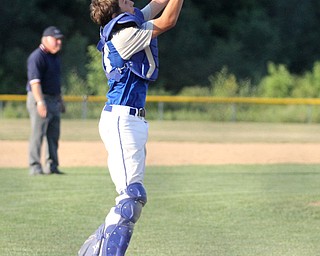 Nikos Frazier | The Vindicator..Poland's catcher, Zachary Yaskulka(13) misses the catch during the Junior Little League State Championship game at the Fields of Dreams in Boardman.