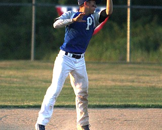 Nikos Frazier | The Vindicator..Poland's Jake Bacon(8) misses the ball in the fifth inning during the Junior Little League State Championship game at the Fields of Dreams in Boardman.
