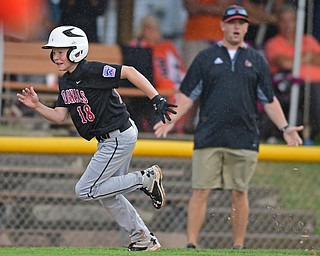 BOARDMAN, OHIO - JULY 29, 2016: Peyton Ahlquist(18) of Canfield sprints home to score during Friday evenings Little League game at the Fields of Dreams. Canfield would go on to win, 12-2.  DAVID DERMER | THE VINDICATOR