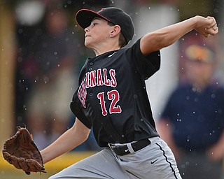 BOARDMAN, OHIO - JULY 29, 2016: Relief pitcher Jake Schneider(12) of Canfield pitches in the fourth inning of Friday evenings Little League game at the Fields of Dreams. Canfield would go on to win, 12-2. DAVID DERMER | THE VINDICATOR