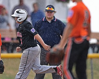 BOARDMAN, OHIO - JULY 29, 2016: AJ Havrillay(3) of Canfield jogs around the bases after hitting a solo home run off pitcher Cash Finnell(2) of Mount Vernon in the fourth inning of Friday evenings Little League game at the Fields of Dreams. Canfield would go on to win, 12-2. DAVID DERMER | THE VINDICATOR