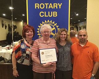 SPECIAL TO THE VINDICATOR
Girard-Liberty Rotary awarded Joyce Faiver, above, second from left, with the Paul Harris Fellowship and installed three new members during a July meeting. The new members, above, are Nancy Rubino, left, Debbie Danyi and Joe Danyi. The Rotary also installed officers for the coming year. At left, from left, are Henry Sforza, treasurer; Randy Suchanek and Stan Nudell, copresidents; Favier, vice president; and Pam Graff, secretary.
