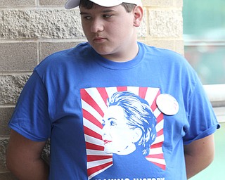 Nikos Frazier | The Vindicator..Caleb Buzard, 13, of Erie, Pa. waits outside of East High School before Democratic Presidential candidate Hillary Clinton spoke on Saturday night.