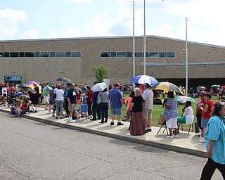 Nikos Frazier | The Vindicator..A crowd gathered ouside of East High School before Democratic Presidential Candidate, Hillary Clinton spoke Saturday night.