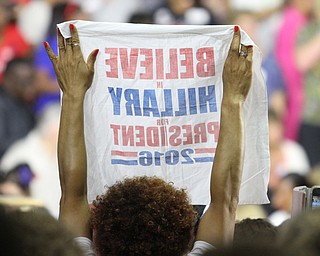 Nikos Frazier | The Vindicator..A woman holds a "Believe in Hillary for President 2016" towel in the East High School gym before Democratic Presidential candidate Hillary Clinton spoke on Saturday night.