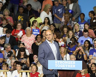 Nikos Frazier | The Vindicator..Schivoni walks on stage in the East High School gym before Democratic Presidential candidate Hillary Clinton spoke on Saturday night.