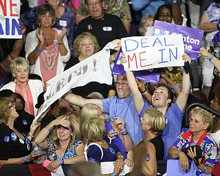 Nikos Frazier | The Vindicator..A protestor holds a "election Fraud" sign in the East High School gym before Democratic Presidential candidate Hillary Clinton spoke on Saturday night.
