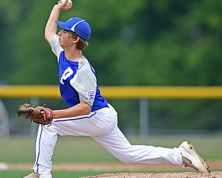 BOARDMAN, OHIO - JULY 30, 2016: Starting pitcher Bailey Swogger #14 of Poland delivers in the second inning of the Little League Junior Division Championship game, Saturday afternoon at the Fields of Dreams. Poland won 8-4. DAVID DERMER | THE VINDICATOR