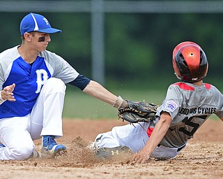 BOARDMAN, OHIO - JULY 30, 2016: Second baseman Jake Bacon #8 of Poland tags out Cordell Hershey #15 of East Holmes as he attempted to steal second base in the third inning of the Little League Junior Division Championship game, Saturday afternoon at the Fields of Dreams. Poland won 8-4. DAVID DERMER | THE VINDICATOR