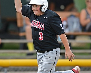 BOARDMAN, OHIO - JULY 30, 2016: AJ Havrillay #3 of Canfield celebrates while running the bases after hitting a three run home run in the fifth inning of Saturday afternoons Little League game at the Fields of Dreams. Canfield won 7-2. DAVID DERMER | THE VINDICATOR