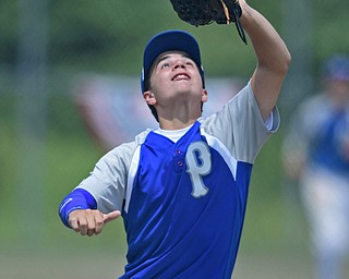 BOARDMAN, OHIO - JULY 30, 2016: Third baseman D.J. Skarote #6 of Poland gets under the fly ball for the out in the sixth inning of the Little League Junior Division Championship game, Saturday afternoon at the Fields of Dreams. Poland won 8-4. DAVID DERMER | THE VINDICATOR