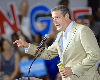 Jeff Lange | The Vindicator  SAT, JUL 30, 2016 - Congressman Tim Ryan speaks during the Hillary Clinton rally Saturday night with a jar of hot peppers for Hillary.