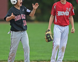 Game 1BOARDMAN, OHIO - JULY 31, 2016: Jack Davis #20 of Canfield celebrates on second base after hitting a double in the second inning of Game 1 of Sunday afternoon Little League Championship DoubleHeader. Canfield won 7-6 in 7 innings. DAVID DERMER | THE VINDICATOR..Andrew Roden #24 of Dover pictured.
