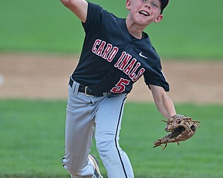 Game 1BOARDMAN, OHIO - JULY 31, 2016: Connor Daggett #5 of Canfield delivers in the third inning of Game 1 of Sunday afternoon Little League Championship DoubleHeader. Canfield won 7-6 in 7 innings. DAVID DERMER | THE VINDICATOR