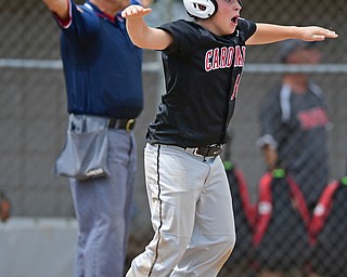 Game 1BOARDMAN, OHIO - JULY 31, 2016: Connor Miller #10 of Canfield jumps in excitement after scoring the game winning run on a hit by Broc Lowry #27 in the seventh inning of Game 1 of Sunday afternoon Little League Championship DoubleHeader. Canfield won 7-6 in 7 innings. DAVID DERMER | THE VINDICATOR
