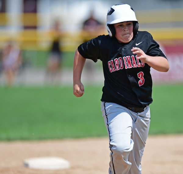 Game 2BOARDMAN, OHIO - JULY 31, 2016: AJ Havrillay #3 of Canfield advances to third base on a single by Broc Lowry #27 in the third inning of Game 2 of Sunday afternoon Little League Championship DoubleHeader. Canfield won 7-6 in 7 innings. DAVID DERMER | THE VINDICATOR