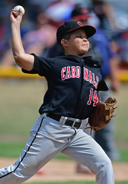 Game 2BOARDMAN, OHIO - JULY 31, 2016: Starting pitcher Ben Slanker #14 of Canfield delivers in the third inning of Game 2 of Sunday afternoon Little League Championship DoubleHeader. Canfield won 7-6 in 7 innings. DAVID DERMER | THE VINDICATOR