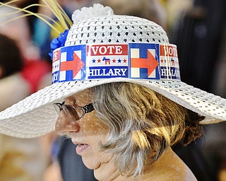 Jeff Lange | The Vindicator  SAT, JUL 31, 2016 - Marilyn Shay of Bazetta Township dons a sun hat decorated to show her support for Hillary Clinton as she waits for Hillary to arrive to a campaign rally at East High School, Saturday night.
