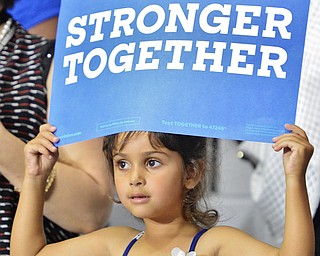 Jeff Lange | The Vindicator  SAT, JUL 31, 2016 - A young Hillary supporter holds a sign during a Clinton campaign rally at East High School, Saturday night.