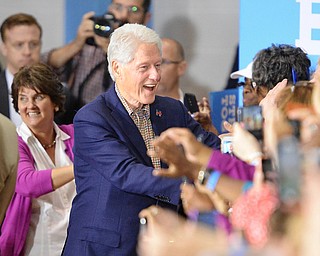 Jeff Lange | The Vindicator  SAT, JUL 31, 2016 - Former President Bill Clinton shakes hands with supporters of his wife, Hillary, during Saturday's campaign rally in Youngstown.