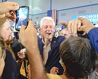 Jeff Lange | The Vindicator  SAT, JUL 30, 2016 - President Bill Clinton greets Hillary supporters after her rally at East High School Saturday night in Youngstown.