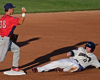 NILES, OHIO - AUGUST 1, 2016: Base runner Logan Ice is forced out at second base by second baseman Evan Rogers in the second inning of Monday nights game at Eastwood Field. DAVID DERMER | THE VINDICATOR