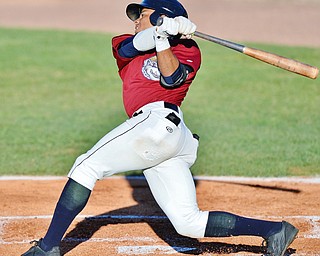 Jeff Lange | The Vindicator  TUE, AUG 2, 2016 - Scrappers' Todd Isaacs follows through after connecting with a pitch in the first inning of Tuesday's game against Williamsport at Eastwood Field.