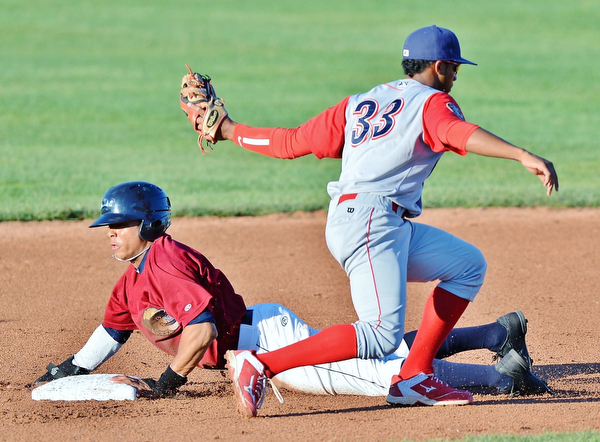 Jeff Lange | The Vindicator  TUE, AUG 2, 2016 - Scrappers' Todd Isaacs (bottom) fails to beat the tag as he attempts to steal second under Williamsport's Luis Espiritu in the first inning of Tuesday's game at Eastwood Field.