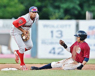 Jeff Lange | The Vindicator  TUE, AUG 2, 2016 - Scrappers' Todd Isaacs (right) slides safely into second as Luis Espiritu of Williamsport drops the ball in the bottom of the third inning of Tuesday's game at Eastwood Field.