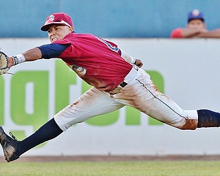 Jeff Lange | The Vindicator  TUE, AUG 2, 2016 - Scrappers left fielder Todd Isaacs stretches out in attempt to catch a fly ball sent far left in the top of the fourth inning of Tuesday's game at Eastwood Field.