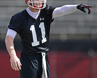 YOUNGSTOWN, OHIO - AUGUST 5, 2016: Quarterback Trent Hosick #11 of YSU calls out the defense before the snap of the ball during a 11 on 11 session of practice Friday afternoon at Stambaugh Stadium. DAVID DERMER | THE VINDICATOR