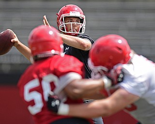 YOUNGSTOWN, OHIO - AUGUST 5, 2016: Nathan Mays looks downfield to pass the football during a 11 on 11 session of practice Friday afternoon at Stambaugh Stadium. DAVID DERMER | THE VINDICATOR