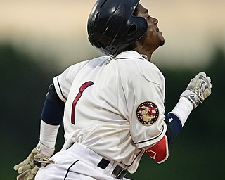NILES, OHIO - AUGUST 10, 2016: Base runner Gabriel Mejia #1 of the Scrappers hustles to first to reach on a bunt in the first inning of Wednesday nights game at Eastwood Field. DAVID DERMER | THE VINDICATOR