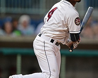 NILES, OHIO - AUGUST 10, 2016: Erlin Cerda #4 of the Scrappers sprints to first after a RBI single in the first inning of Wednesday nights game at Eastwood Field. DAVID DERMER | THE VINDICATOR